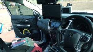 Test equipment mounted in the vehicle cabin